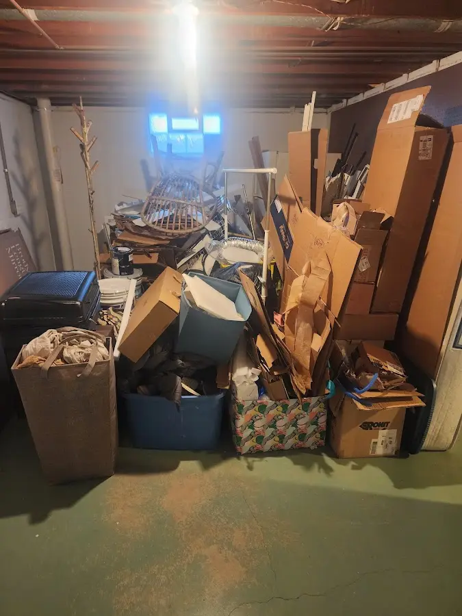 Roll-off dumpster container at job site for 2 Yard Dumpster Rental in Troy